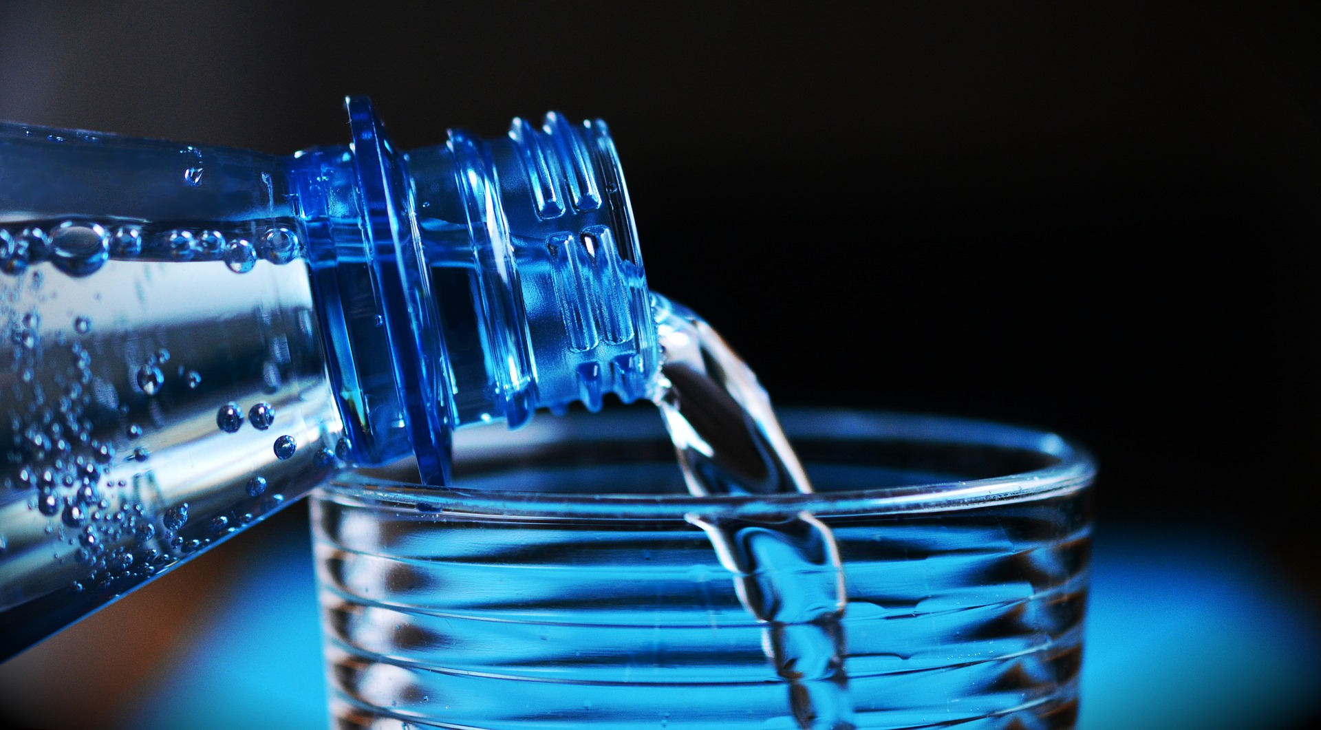 Water poring from bottle